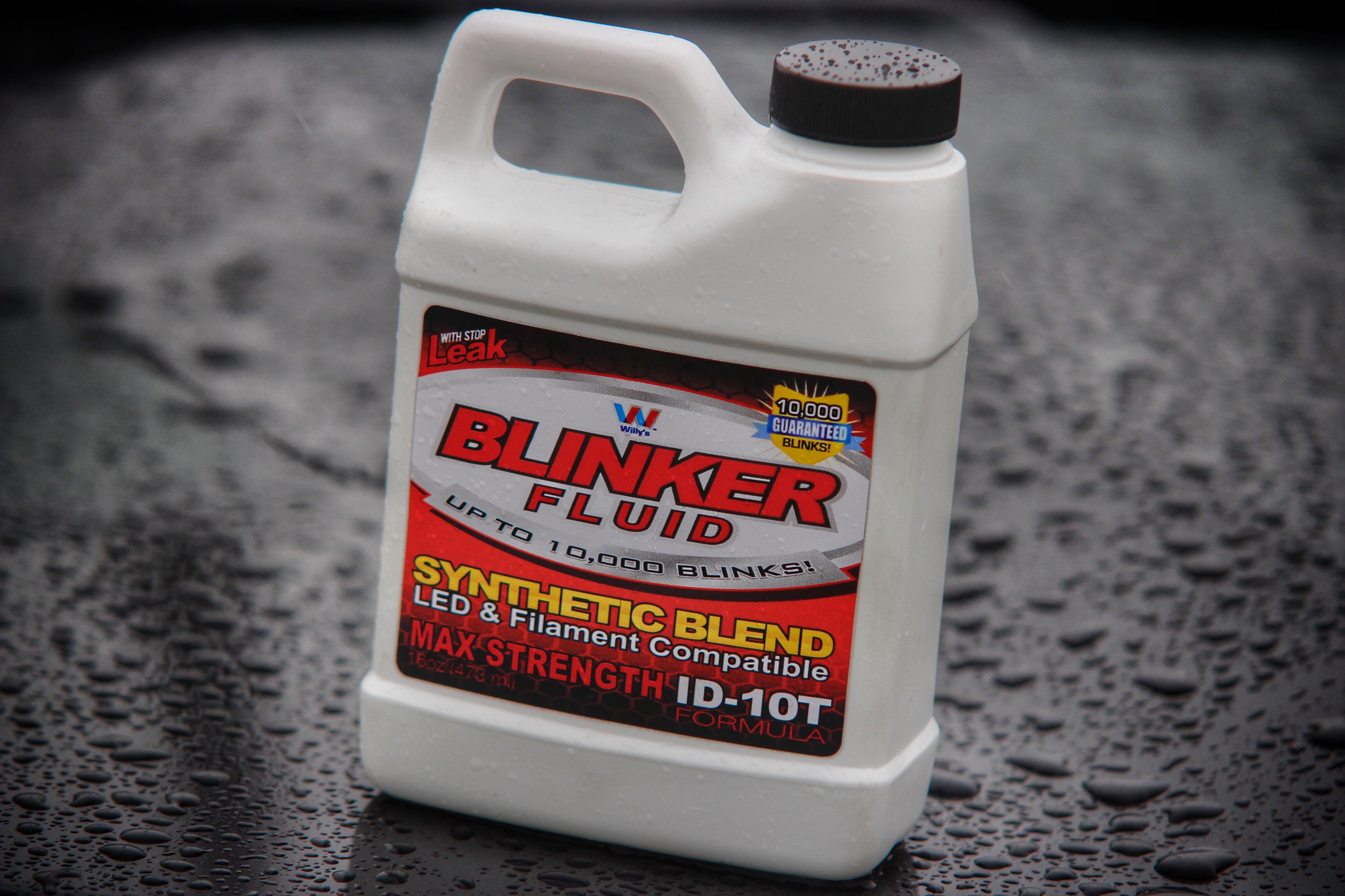 Blinker Fluid gag gift bottle displayed near a vehicle